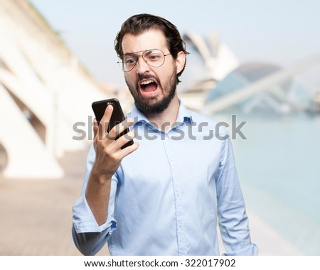 angry young man with mobile