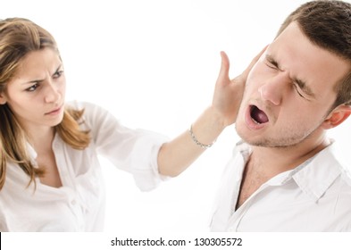 angry young woman slap boyfriend with her hand