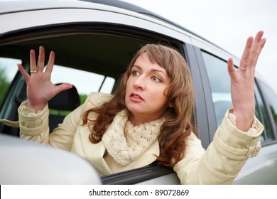 Angry Young Woman Stuck In A Traffic Jam