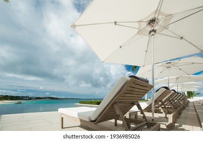 Anguilla Island, Anguilla British West Indies - December 3, 2015 Four Season Resort Pools And Gardens Over A Cliffs With Barnes Bay View. 