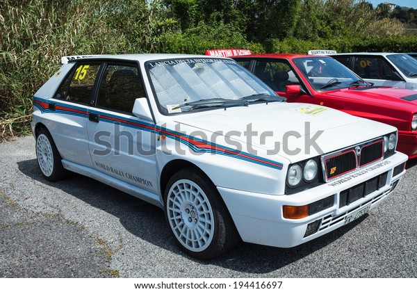 ANGUILLARA SABAZIA, LAZIO,\
ITALY - APRIL 6, 2014: Many Lancia Delta vintage rally cars joined\
with the occasion of the 11-th meeting of spring memorial Luciano\
Polverari. 