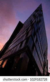 an angular building exterior at dusk