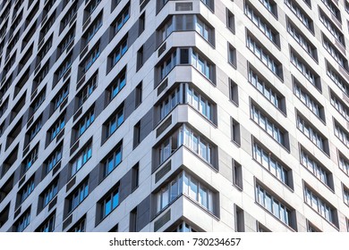 Angular facade.
Horizontally.Triangular building of modern architecture.