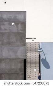 Angular house facades and roofs with a lantern in front of it / Angular facades             