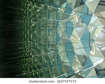 Angular mirrors interlace, reflecting light into fragmented brilliance. The geometric symmetry creates a mesmerizing kaleidoscopic illusion, where every facet refracts a new dimension.