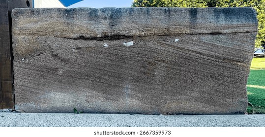 An angular unconformity is an unconformity where horizontally parallel strata of sedimentary rock are deposited on tilted and eroded layers.