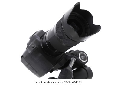 Angular view of camera glass of new black camera isolated