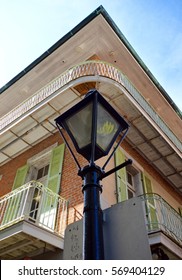 Angular View Of Corner Of New Orleans Building With Lamp Post 