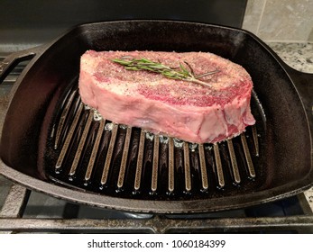 Angus Ribeye Steak On The Cast Iron Skillet