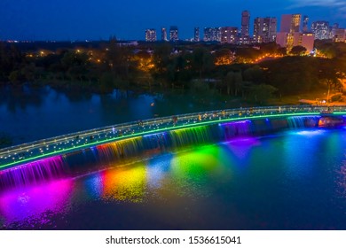 Anh Sao Or Starlight Bridge Is A Pedestrian Bridge With A Waterfall And Beautiful Colored Lighting On The Saigon River. It Is A Major Tourist Attraction In District 7 Of Ho Chi Minh City In Vietnam