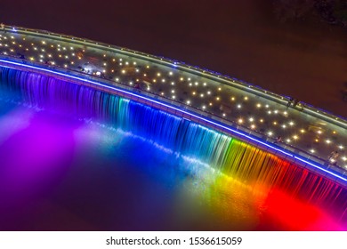 Anh Sao Or Starlight Bridge Is A Pedestrian Bridge With A Waterfall And Beautiful Colored Lighting On The Saigon River. It Is A Major Tourist Attraction In District 7 Of Ho Chi Minh City In Vietnam