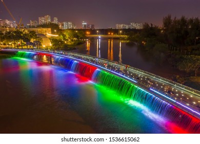 Anh Sao Or Starlight Bridge Is A Pedestrian Bridge With A Waterfall And Beautiful Colored Lighting On The Saigon River. It Is A Major Tourist Attraction In District 7 Of Ho Chi Minh City In Vietnam