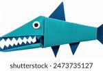 Animal aquatic water concept origami isolated on white background of a cute, adorable, scary giant or great barracuda fish - Sphyraena barracuda - with copy space, simple starter craft for kids