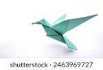 animal bird avian concept origami isolated on white background of a cute, adorable, hummingbird, with copy space, simple starter craft for kids