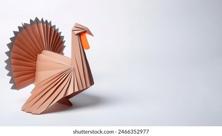 animal bird avian concept origami isolated on white background of a Tom turkey male gobbler - Meleagris gallopavo - popular thanksgiving meal in USA, with copy space, simple starter craft for kids - Powered by Shutterstock