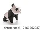 Animal concept origami isolated on white background of black and white panda bear - Ailuropoda melanoleuca, with copy space, simple starter craft for kids