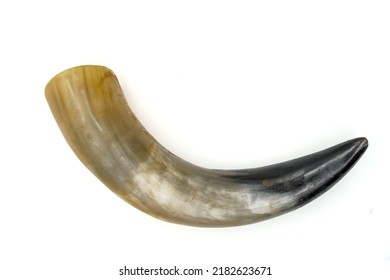 Animal horn for drinking in ancient barbarian peoples. Isolated on white background - Shutterstock ID 2182623671