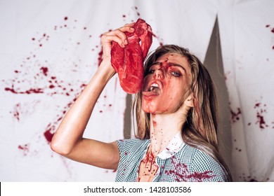 Animal Hunger. Meatman In Butcher Shop, Butchery. Cannibalism. Donation And Donar. Bloody Halloween. Anatomy. Zombie. Medical Transplantation. Woman In Blood. Human Internal Organ Trade Ribeye Steak