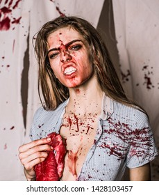 Animal Instinct. Aggressive Girl In Blood. Human Internal Organ Trade. Bloody Halloween. Anatomy. Zombie. Medical Transplantation. Cannibalism. Donation And Donar. Meatman In Butcher Shop. Butchery