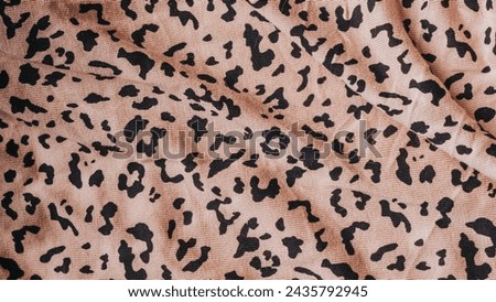 animal pattern texture design on clothings and garments, best suited for fashion, trending and stylish fabric design, animal skin spotted pattern, black spots on light pink garment, print