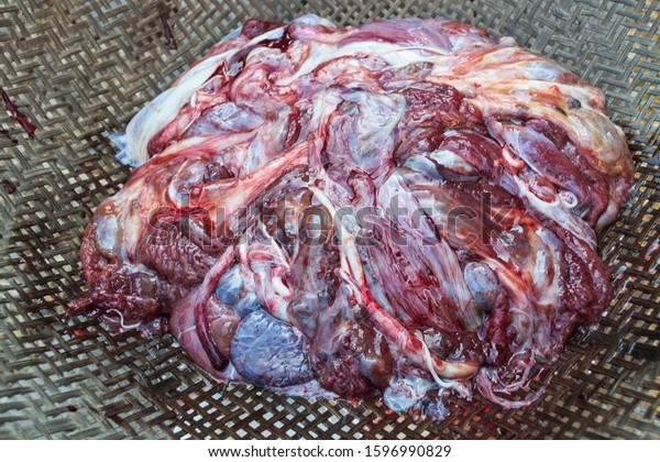 Animal placenta from\
cow,placenta will come out following the delivery birth of a calf,\
local food.