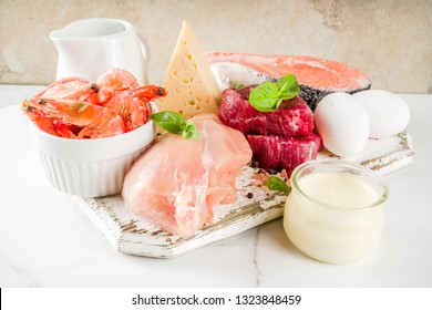 Animal Protein Sources - Raw Beef Meat Steak, Chicken Breast Fillet, Salmon Fish, Eggs, Dairy Milk, Shrimps, Cheese, Copy Space