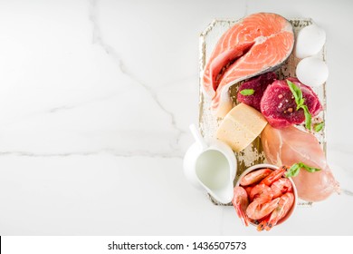 Animal Protein Sources - Raw Beef Meat Steak, Chicken Breast Fillet, Salmon Fish, Eggs, Dairy Milk, Shrimps, Cheese, Copy Space