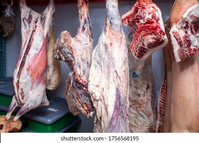 Animals Hang In A Meat Locker In A Butcher Shop Refrigerator