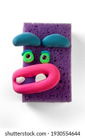 Animated sponge with eyes and lips by soft modeling clay. Emotions things - Shutterstock ID 1930554644
