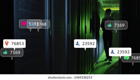 Animaton of social media icons against asian male engineer using laptop at computer server room. Social media networking and business data storage technology concept - Powered by Shutterstock