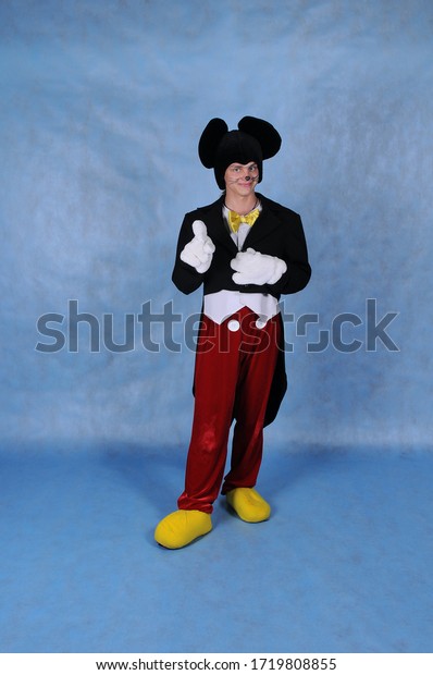 Animator for children in a Mickey mouse costume\
in the Studio in costume, Moscow, June 10, 2014. Animator for a\
holiday for children