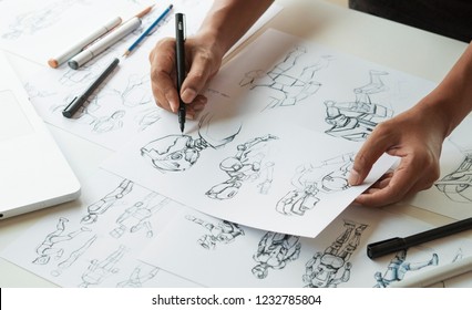 Animator designer Development designing drawing sketching development creating graphic pose characters sci-fi robot Cartoon illustration animation video game film production , animation design studio. - Shutterstock ID 1232785804