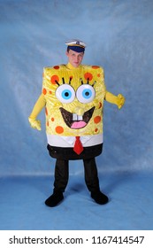 Animator in a suit spongebob in the Studio on a blue background in Moscow June 10, 2014