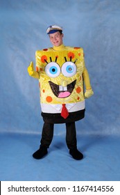 Animator in a suit spongebob in the Studio on a blue background in Moscow June 10, 2014