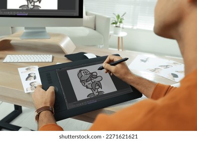 Animator using graphic tablet and computer, closeup. Illustration on screen - Powered by Shutterstock - Get 15% off with code: PIKWIZARD15