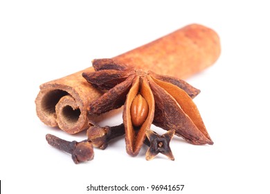 Anise and cinnamon, ingredients for preparation mulled wine, closeup on white - Powered by Shutterstock