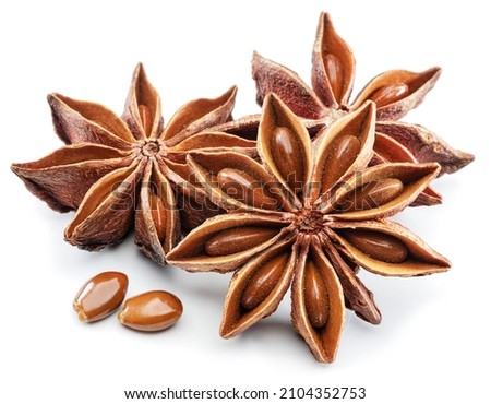 Anise star and aniseeds, spice with strong taste used in cooking, isolated on white background.