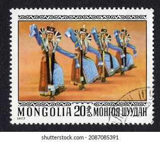 Ankara, Türkiye - 12,07,2021: A Mongolia Postage Stamp Shows Traditional West Mongolian Dance. Circa 1977