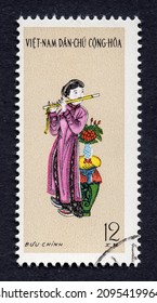 Ankara, Türkiye - 12,23,2021: A Viet Nam Postage Stamp Shows Traditional Costumes And Dance.