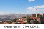 Ankara kalesi - Ankara castle landscape.Turkish flag waving in Ankara Castle on a beautiful summer day.