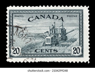 Ankara, Turkey - 01,11,2022: A Canada Postage Stamp Shows Combine Harvester, Circa 1946