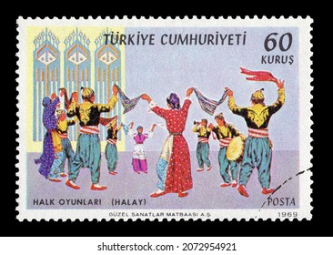 Ankara, Turkey - 11,11,2021: A Republic Of Turkey Postage Stamp Shows Scene Of Turkish Traditional Folckloric Dance. Circa 1969