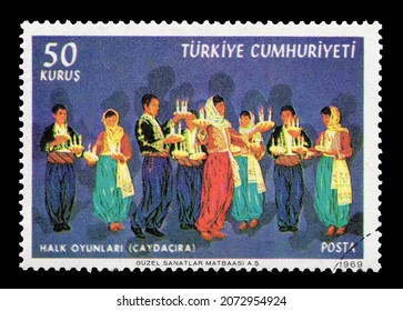 Ankara, Turkey - 11,11,2021: A Republic Of Turkey Postage Stamp Shows Scene Of Turkish Traditional Folckloric Dance. Circa 1969