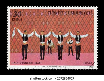 Ankara, Turkey - 11,11,2021: A Republic Of Turkey Postage Stamp Shows Scene Of Turkish Traditional Folckloric Dance. Circa 1969