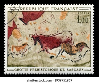 Ankara, Turkey - 20 March 2021: A French postage stamp shows Prehistoric depictions of Lascaux. Circa 1968. Canceled by seal...