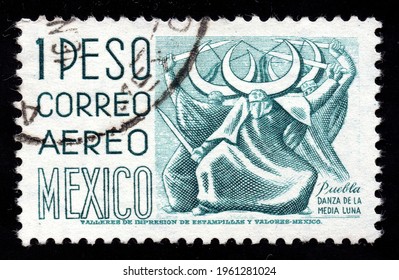 Ankara, Turkey - 23 April 2021: A Mexico Postage Stamp Shows Puebla, Dance Of The Half Moon. Circa 1950...