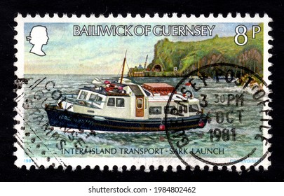 Ankara, Turkey - 3 June 2021: A Bailiwick of Guernsey postage stamp shows  inter island transport, sark launch. Circa 1981...