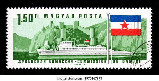 Ankara, Turkey - 8 May 2021: A Hungary Postage Stamp Shows Ship And Flag, Danube Commission Series. Circa 1967...