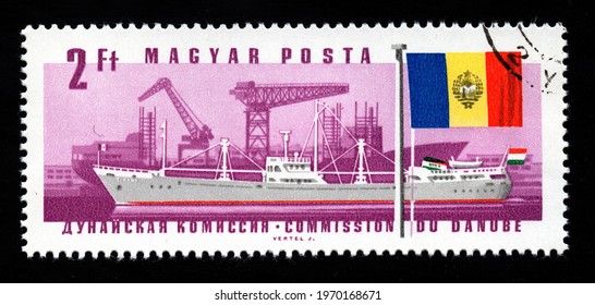 Ankara, Turkey - 8 May 2021: A Hungary Postage Stamp Shows Ship And Flag, Danube Commission Series. Circa 1967...