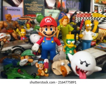 Ankara,  Turkey-February 3, 2019: Super Mario Bros, Simpsons, Scrat, Snoopy, He-Man And Other Cartoon Toyz On A Shelf.